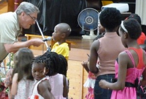 Ross Jutsum leads the children in worship