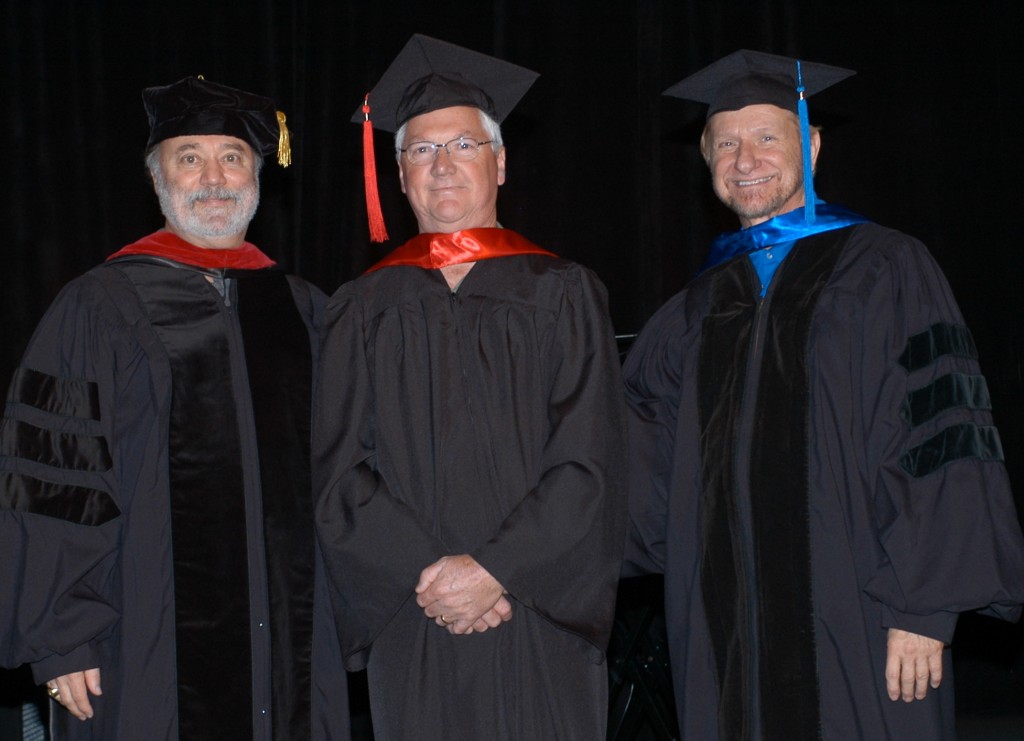 Graduate Sam Butler (center) with GCS board members Dr. Joseph Tkach (left) and Dr. Dan Rogers (right)