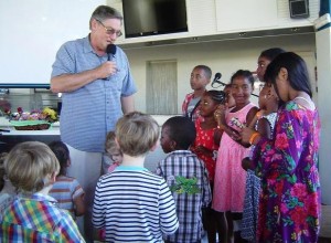 Ross Jutsum leads children's choir