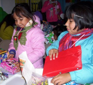 Crossing Borders children openting presents