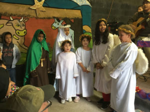 Crossing Borders Kids Dressed Up as Angels at Marta Nativity Scene